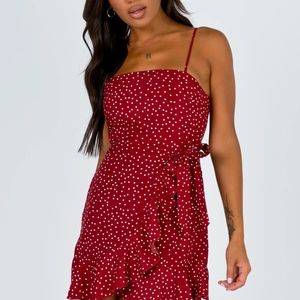 Red dress with white polka dots
